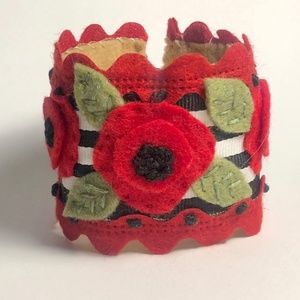 Hand- sewn embroidered red felt flower cuff bracelet